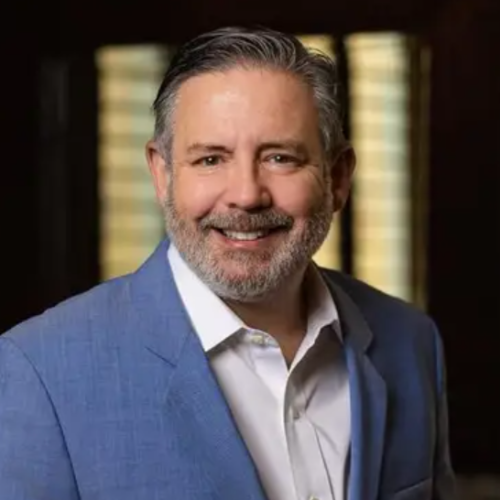 Image of Phil Shawe in a blue suit